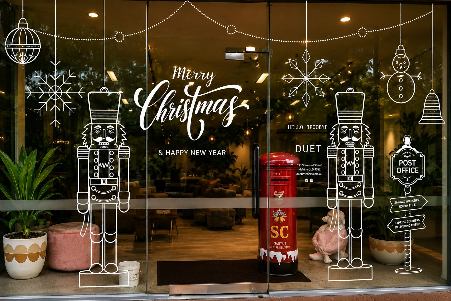 Christmas-themed shopfront window graphics with nutcracker illustrations